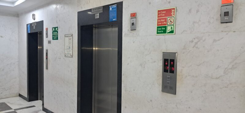 Heavy-duty service elevator and spacious floor lobby in a commercial building for rent in Okhla Phase 2.