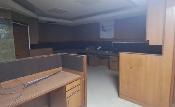 Cluster of ergonomic desks and chairs inside a small furnished office space in Okhla Phase 3