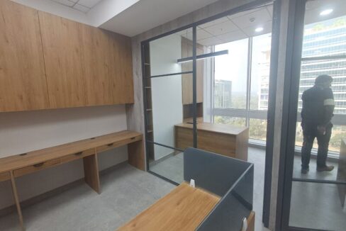 Premium furnished corporate office space interior with workstations in DLF Prime Towers Okhla Delhi.