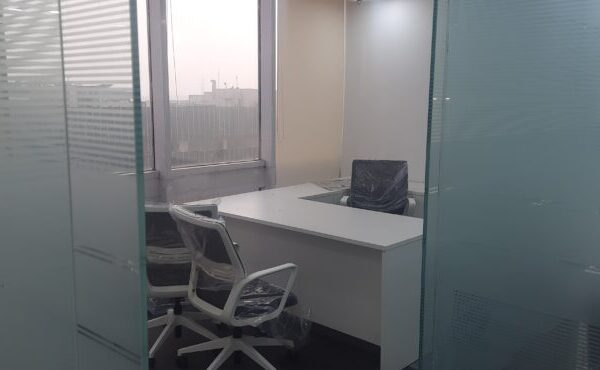 Glass-partitioned executive manager cabin and meeting area in FIEE Complex Okhla Phase 2.