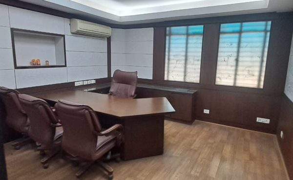 Professional glass entrance door of a small office space for rent in Okhla Phase 3.
